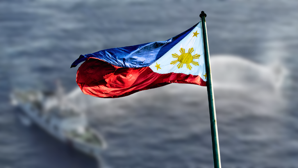 Philippine flag by the sea